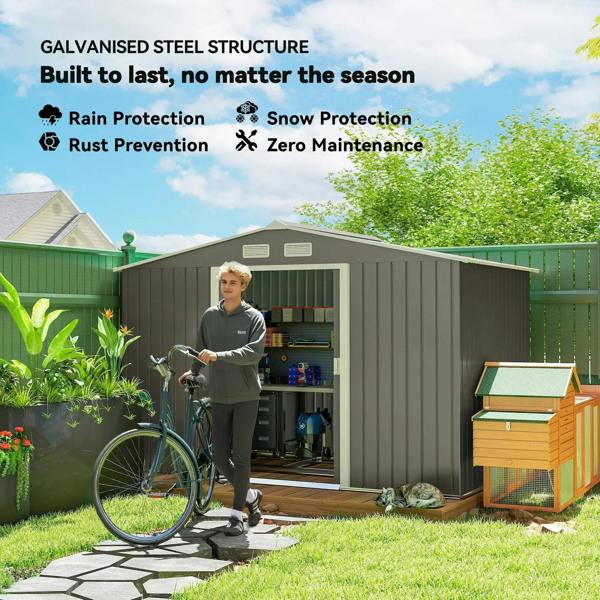 Grey metal storage shed with open double doors and roof vent panel in outdoor yard