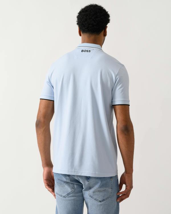 back shot of a model wearing a BOSS Green Paddy Pro Mens Cotton Blend Polo Shirt With Contrast Logos in Open Blue 460