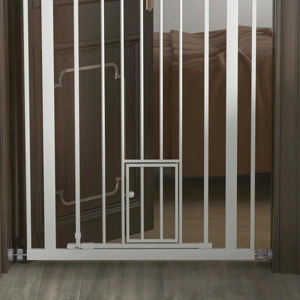 White pet gate bottom section with small door panel and secure base