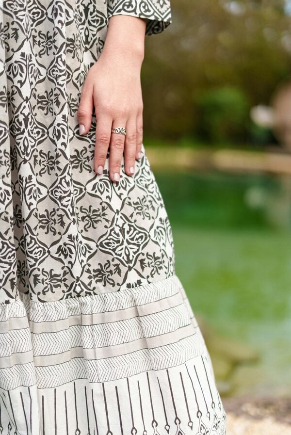 Aria Black and ecru woodblock print midi dress with tie front detail. 100% cotton