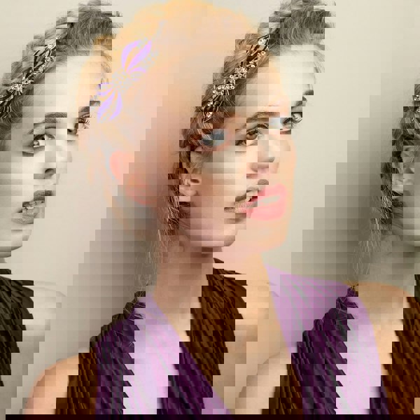 bow hair clip in purple updo hairstyle