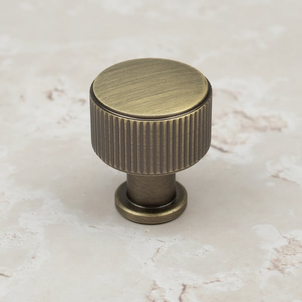 Handle & Home Antique Brass Reeded Handles and Coordinating Knobs