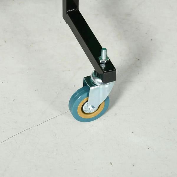 Caster wheel under the folded green tennis table frame with a metal support pin