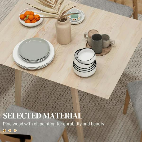 Natural wood dining table top with place settings and visible wood grain texture