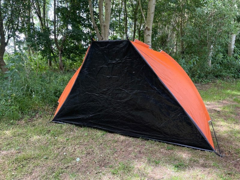 An image of the beach tent with the sewn in groundsheet up.