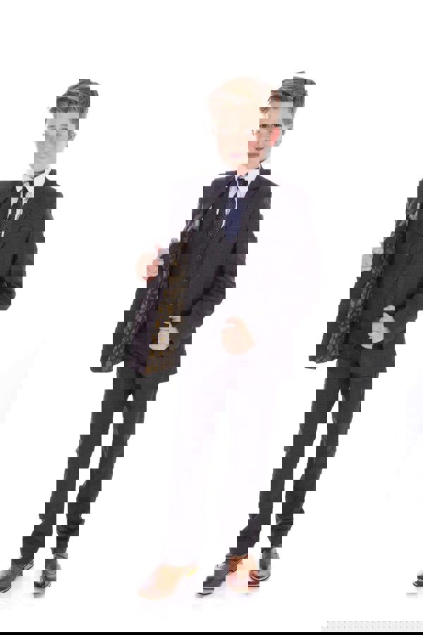 young boy wearing grey suit