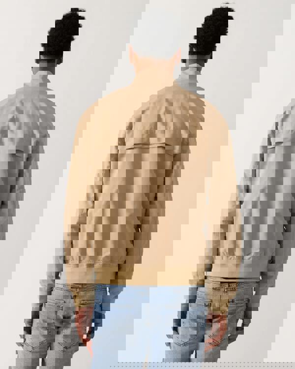 back shot of a Model wearing a Lacoste Lightweight Water-Repellent Twill Mens Harrington Jacket in Viennese 02S