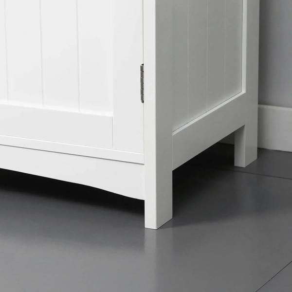 White under-sink cabinet with raised legs and double-door base panel