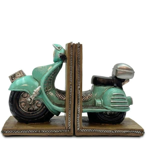 A pair of quirky vintage mint green polyresin scooter bookends split into two halves, isolated on a clean white background.