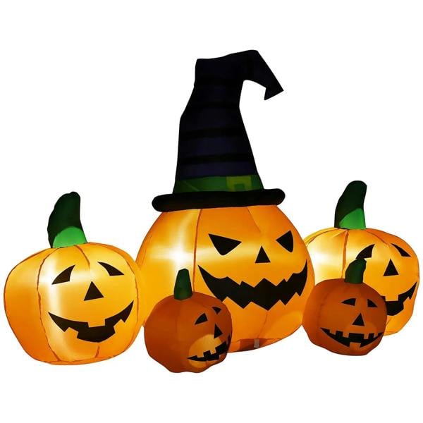 Inflatable jack-o'-lantern pumpkin display with black witch hat and four small pumpkins