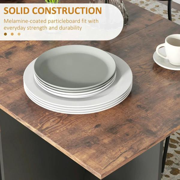 Rustic brown drop-leaf folding dining table with stacked white dishes on top surface.