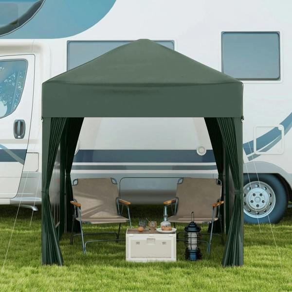 Green pop-up gazebo canopy with open front and visible interior table and chairs