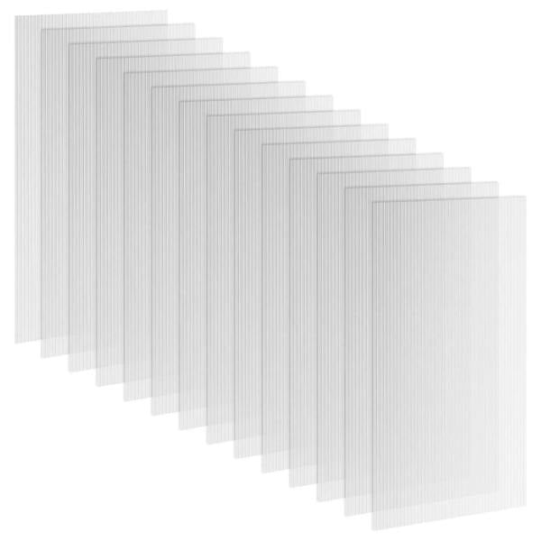 Clear twin-wall polycarbonate roofing panels, stacked with ribbed texture and channels