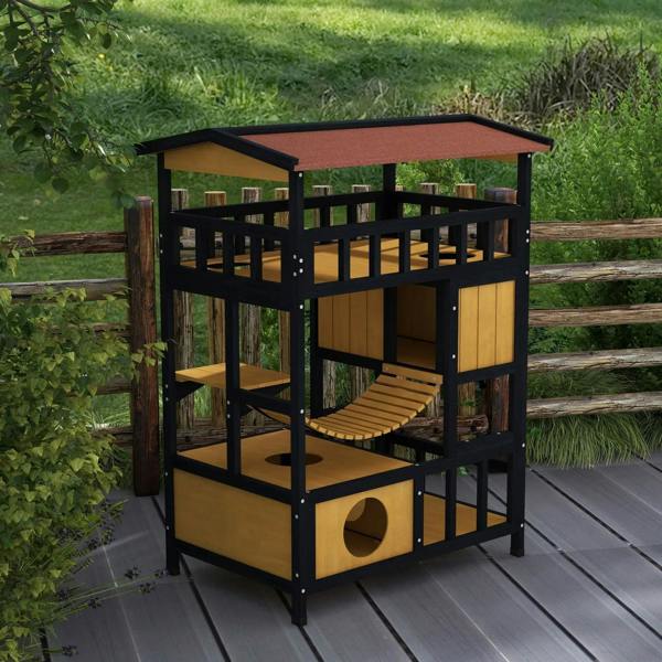 Back view of four-tier wooden outdoor cat shelter with open platforms and entry doors