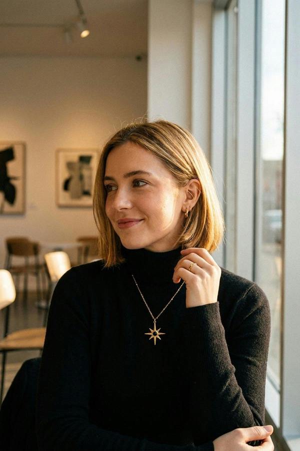 ARIIRA Gaia Gold Tone Starburst Pendant Necklace
