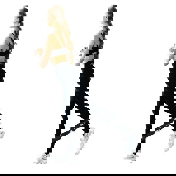 Woman exercising with the XX-Heavy York resistance loop