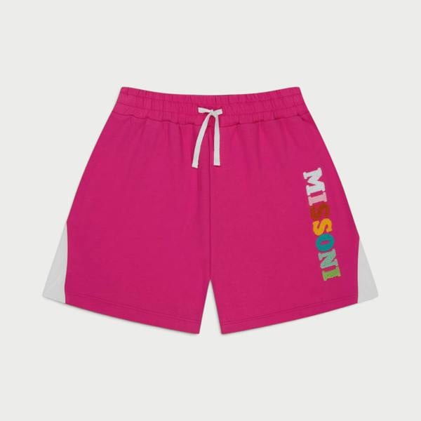Supplied Fashion kids fleece jogger shorts in pink with a white drawstring, elastic waist, and side logo detail.