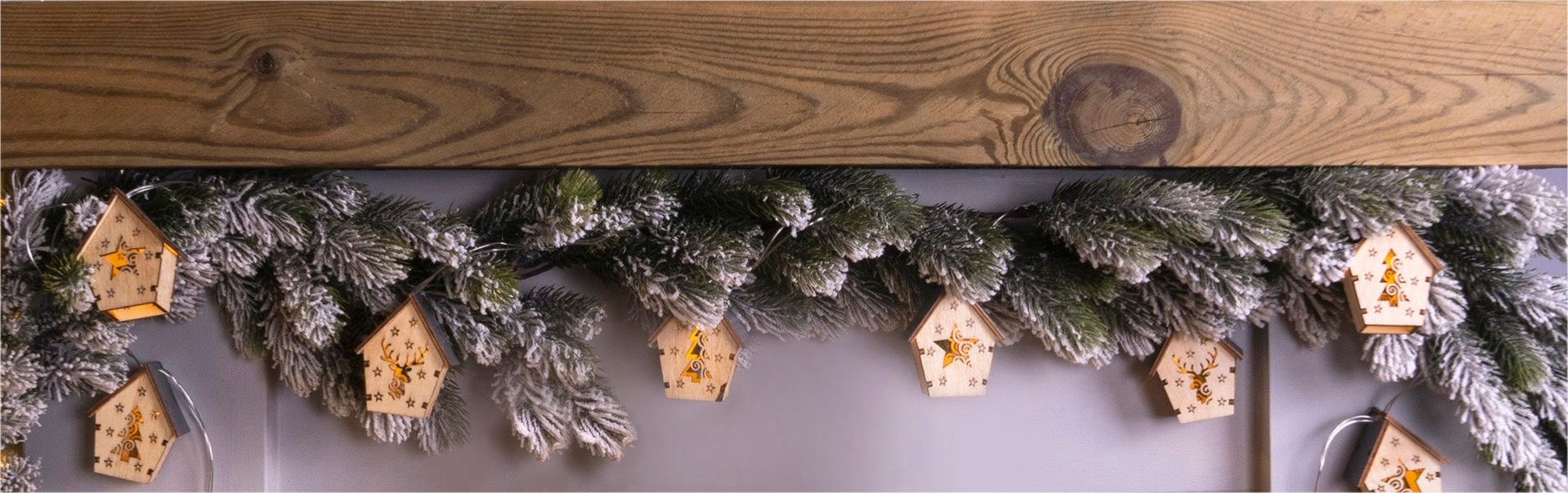 St Helens 10 WOODEN FESTIVE HANGING HOUSES WITH LED LIGHTS