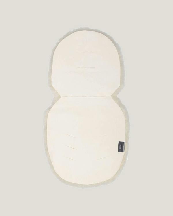 Back detail of sheepskin pram liner