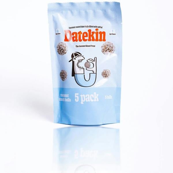 Datekin coconut covered date balls packaging on a white background with a reflection.