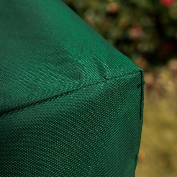 Green protective cover corner with stitched hem and textured Oxford fabric weave