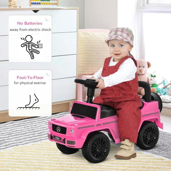 Pink kids ride-on push car with black seat and steering handle, child indoors.