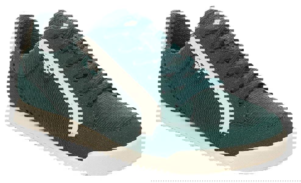 Rocket Dog Bolt Womens Casual Smart Lace Up Shoes Trainers, green and white sneaker with lace-up closure and comfortable sole.