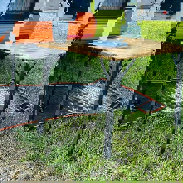 Awning Tunnel Mat 1500mm x 800mm Black Rubber with Orange Edge Trim being used within a campervan awning tunnel.