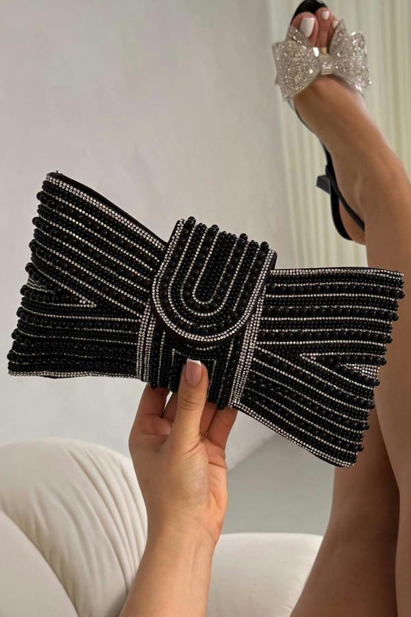 Sparkly Pearl Bow Clutch Bag Black with magnetic flap closure