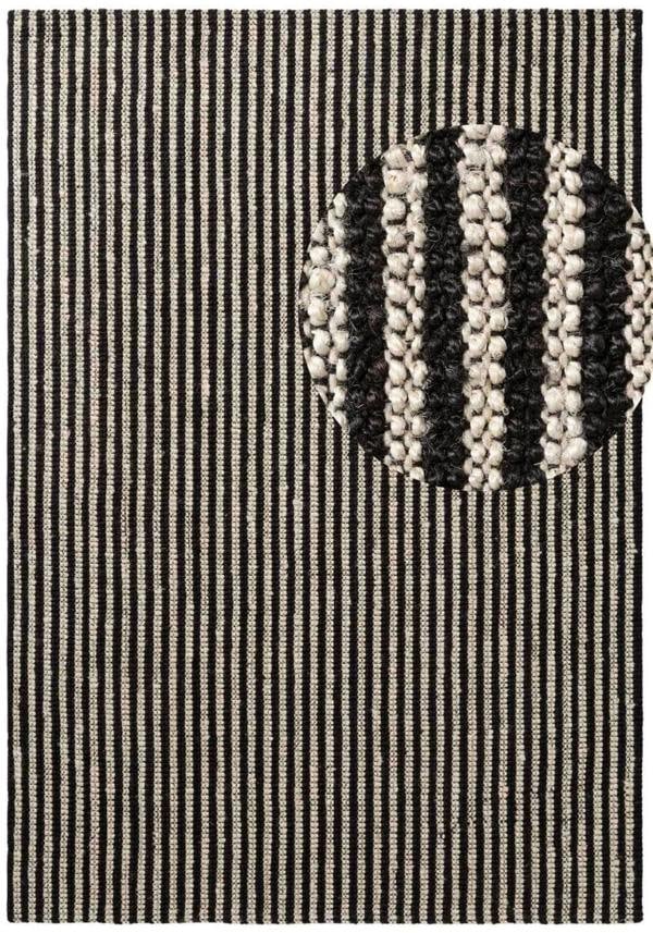 Textile patch with a circular design featuring three horizontal stripes on a striped background