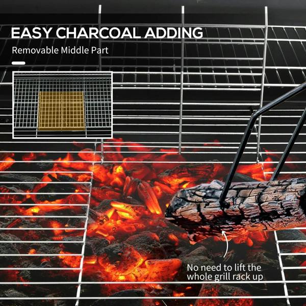 Black charcoal BBQ grill interior with removable middle grate and fire below