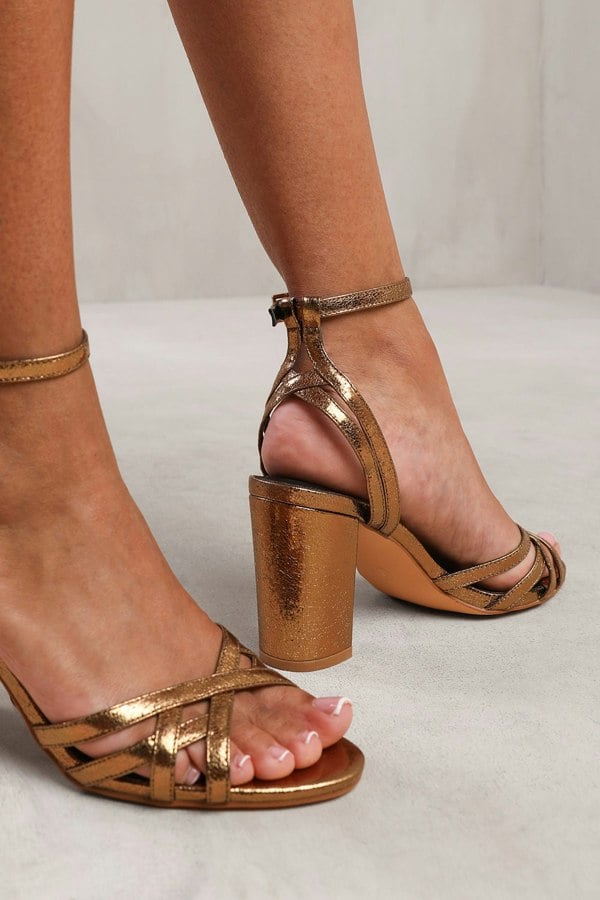 Where's That From Esmer Mid Block Heel With Cross Over Strap Detailing in Gold Crinkle Faux Leather