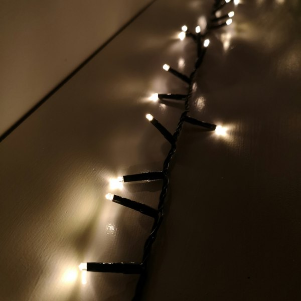 Samuel Alexander 1000 LED 25m Indoor Outdoor Christmas Multi Function Mains Operated String Lights with Timer in in Warm White