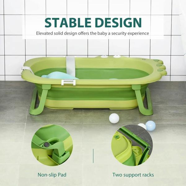 Green baby bath tub with non-slip base pads, legs, and blue cushion