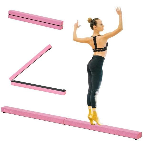 Pink folding balance beam with pink foam surface for home gymnastics balance training.