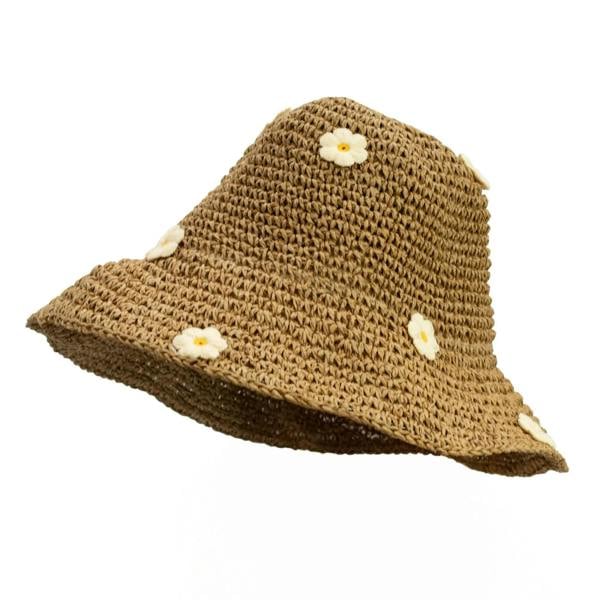 Tan woven straw floppy sun hat with three white daisy appliques and wide brim