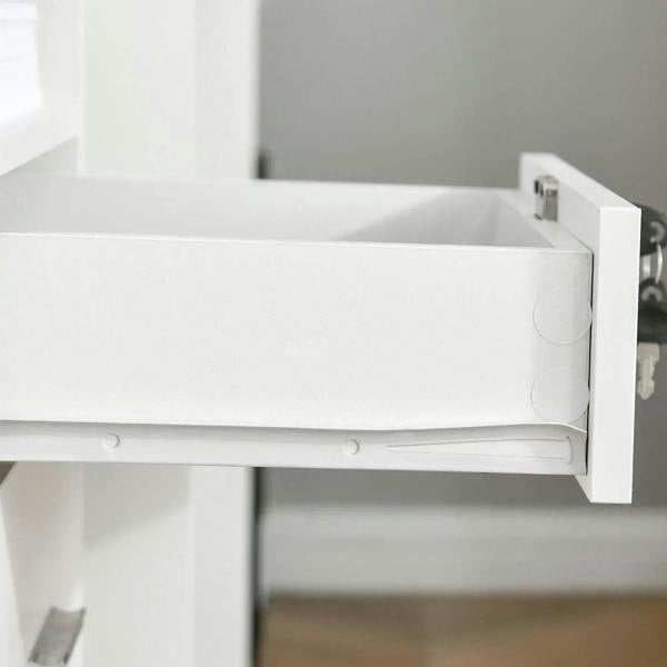 White drawer interior rail and side stop detail inside filing cabinet