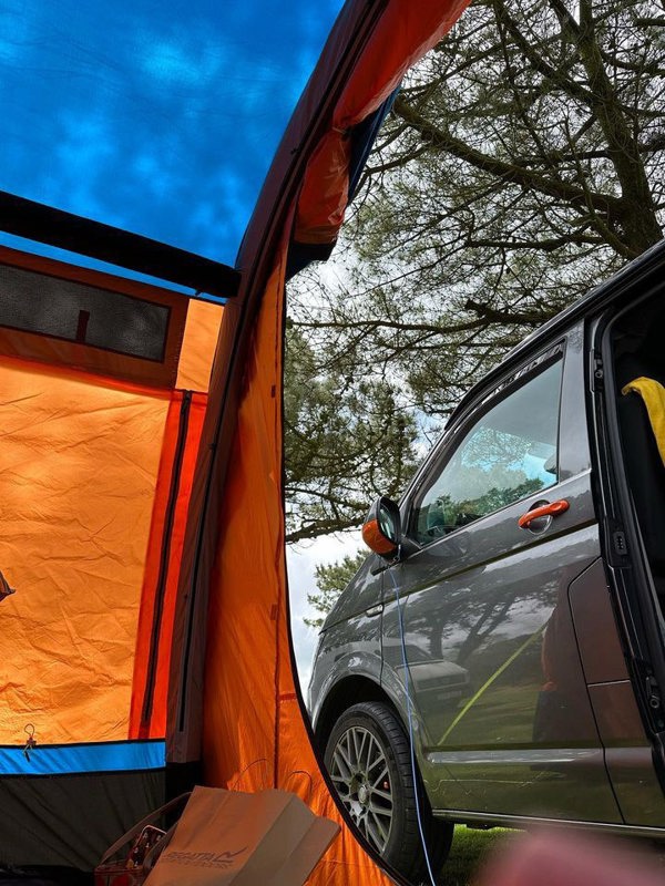 The tunnel of a Loopo Breeze® v2 Inflatable Campervan Awning OLPRO imageset:Orange