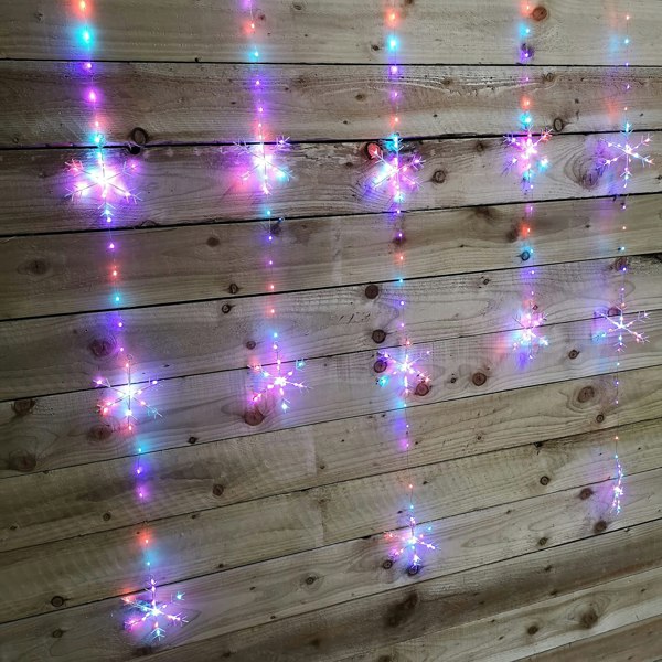 Samuel Alexander 390 LED 1.3m x 1.2m Christmas Snowflake Curtain Lights in Static Rainbow & Twinkling Orange