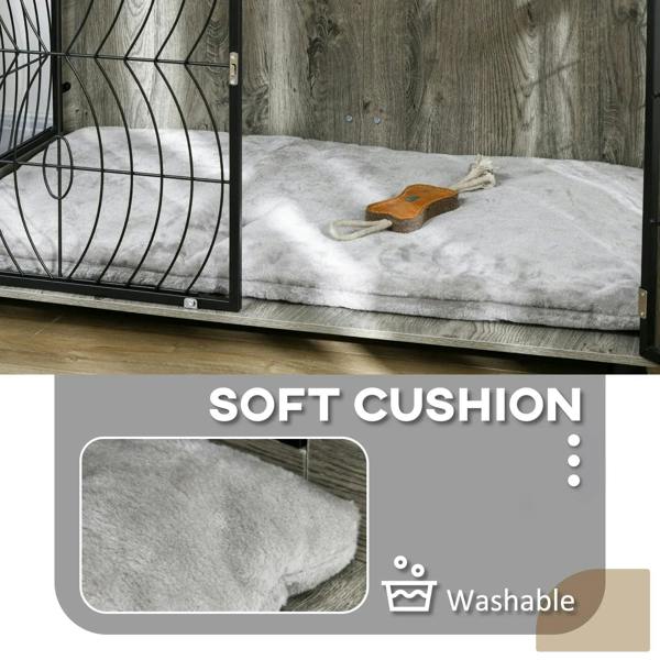 Grey dog crate end table with black wire door and plush cushion inside