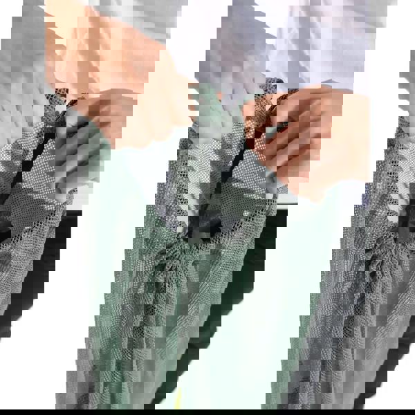 Arena One Go green mesh bag with black strap for carrying swim gear