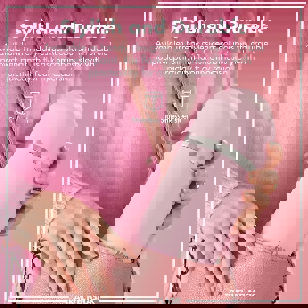 A pink travel flask is being placed into a matching pink purse by a person wearing a pink sweater. Text reads: "Stylish and Durable Available in trendy designer colours with durable powder paint this flask combines style with practicality for any occasion Stainless steel TRAVEL FLASK"