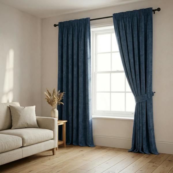 Castello made-to-measure curtains in Midnight, styled in a living room