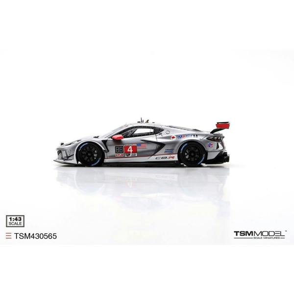 a silver race car with numbers on it