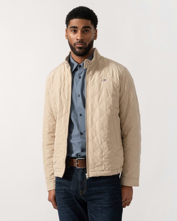 Model wearing GANT Mens Quilted Windcheater Jacket in 200 Oat Beige - Main
