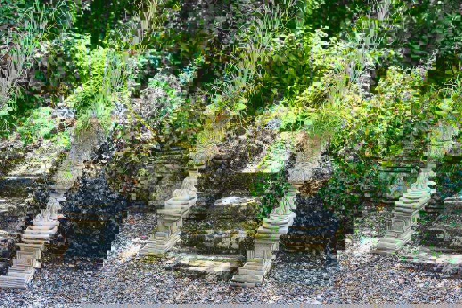 Pair of Large Victorian Stone Cast Urns with Plinths