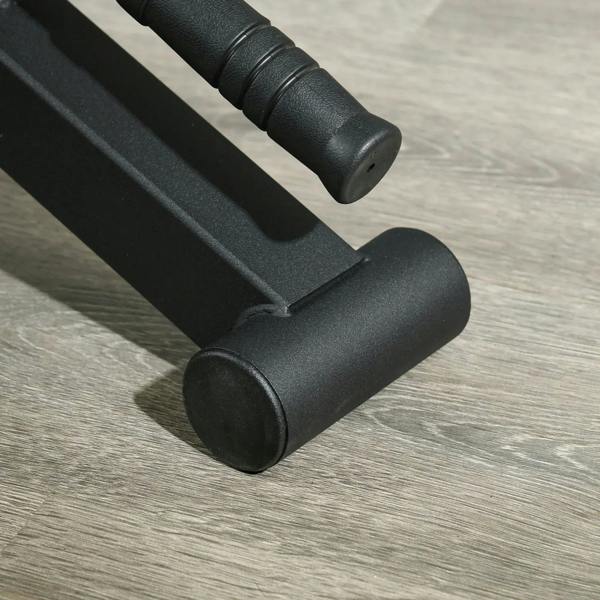 Black deadlift barbell jack close-up of rubber feet for stable floor contact
