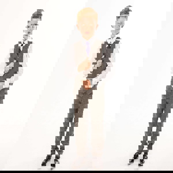 boy modelling tweed trousers and matching waistcoat