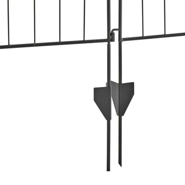 Black ground stakes with pointed tips attached to metal fence legs