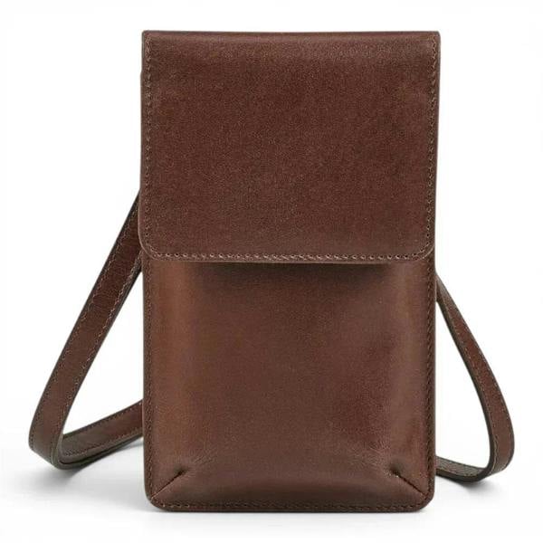 Wholesale cognac leather phone bag crafted from premium real
leather with magnetic flap closure.